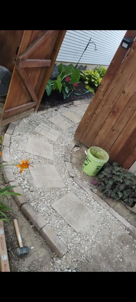 Expert lawn care service in Macomb, IL by Sandlin Roofing & Landscaping