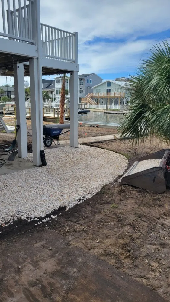 Trusted residential landscaping with custom design in Shallotte, NC by Sandman Tree Service & Construction