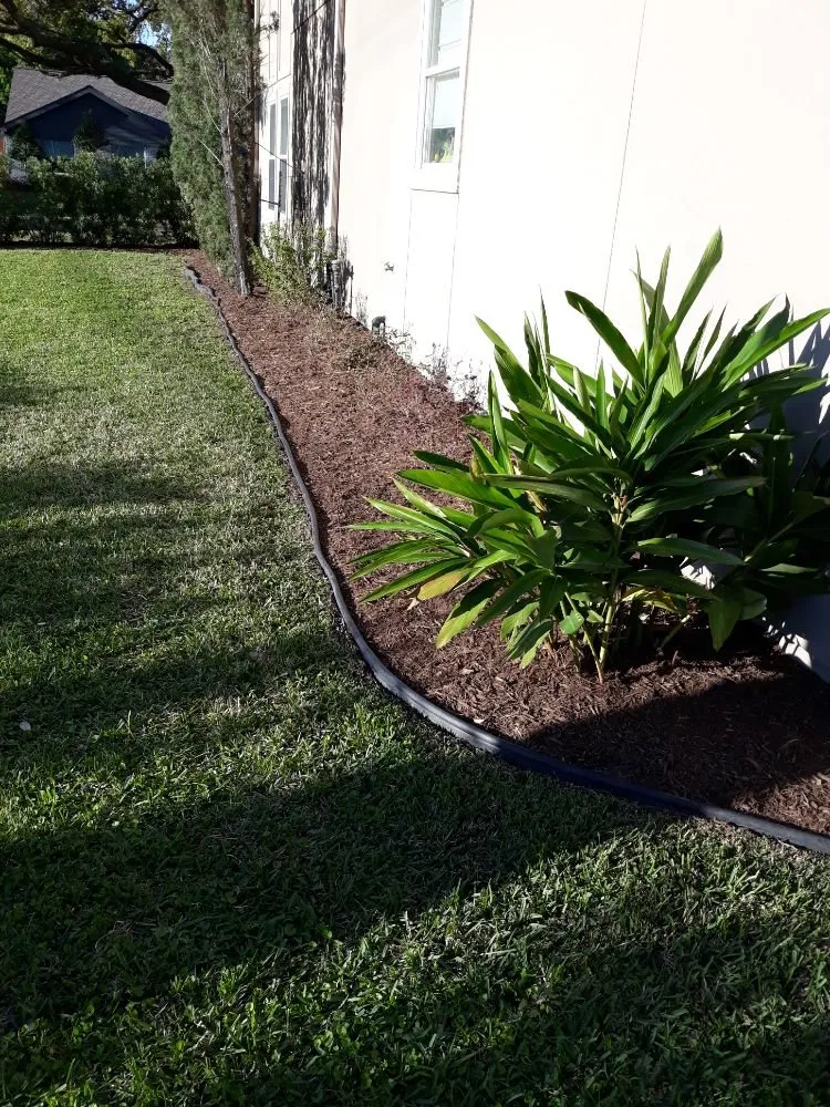 Expert garden landscaping for outdoor upgrades across Houston, TX - Santiago and Son's Lawn Care