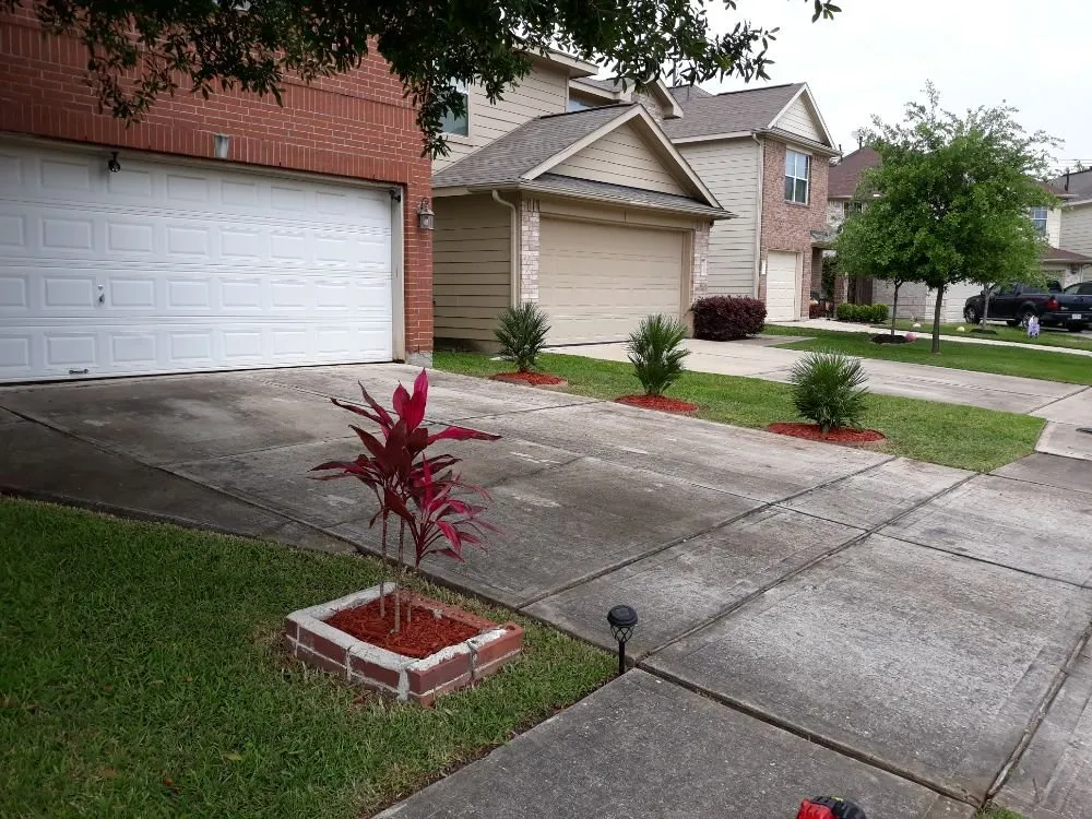 Affordable garden landscaping with custom design across Houston, TX - Santiago and Son's Lawn Care