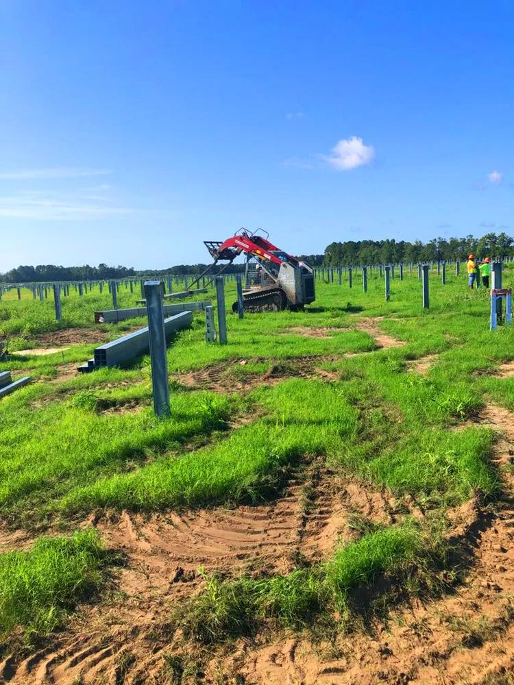 Professional lawn mowing service for year-round maintenance in Goldsboro, NC by Santiago Solutions