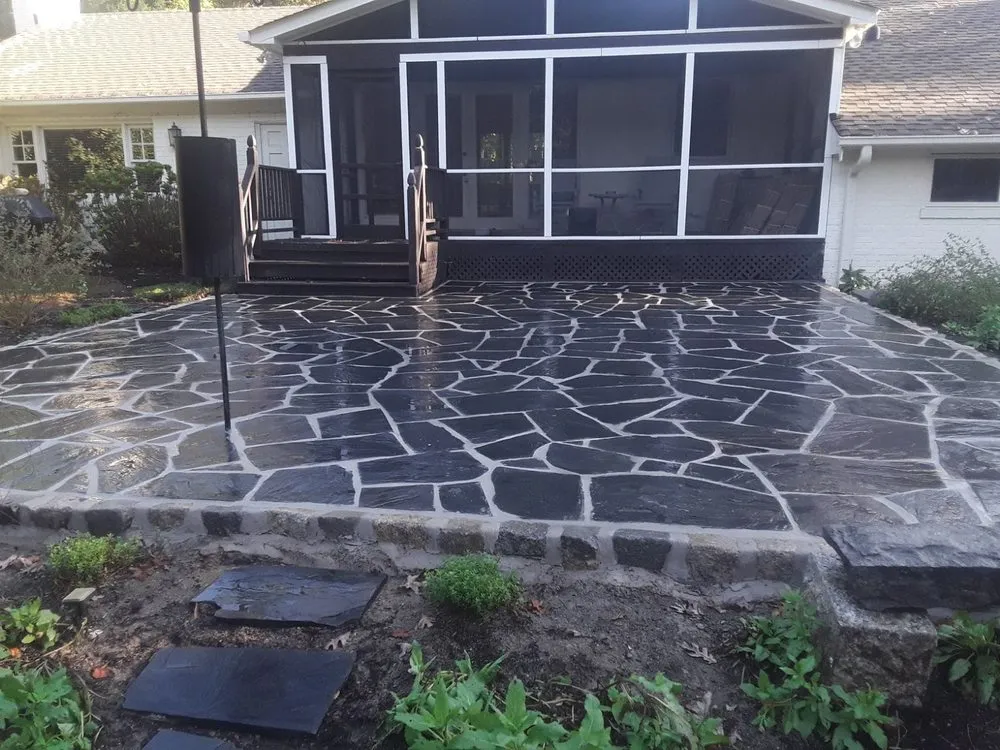 Expert lawn mowing service in Richmond, VA by Santos Design and Services