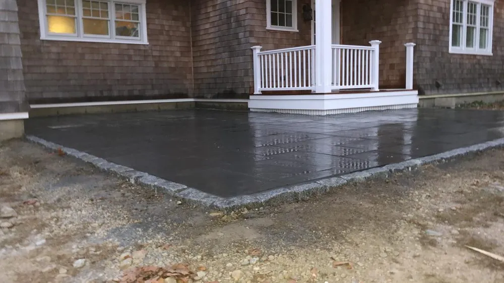 Affordable lawn mowing service for outdoor upgrades in Fall River, MA by Santos Masonry