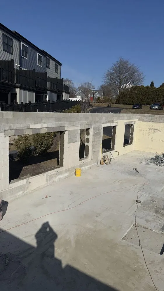 Expert lawn mowing service for residential properties across Fall River, MA - Santos Masonry