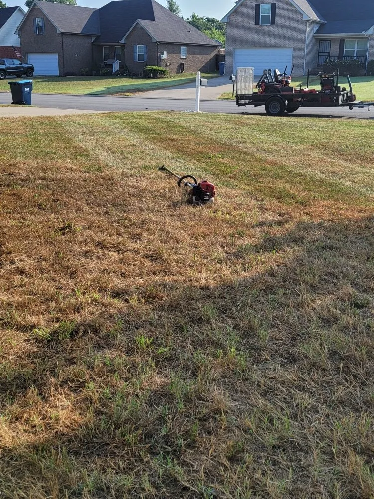 Local lawn mowing service with custom design in Murfreesboro, TN by Santys Lawncare