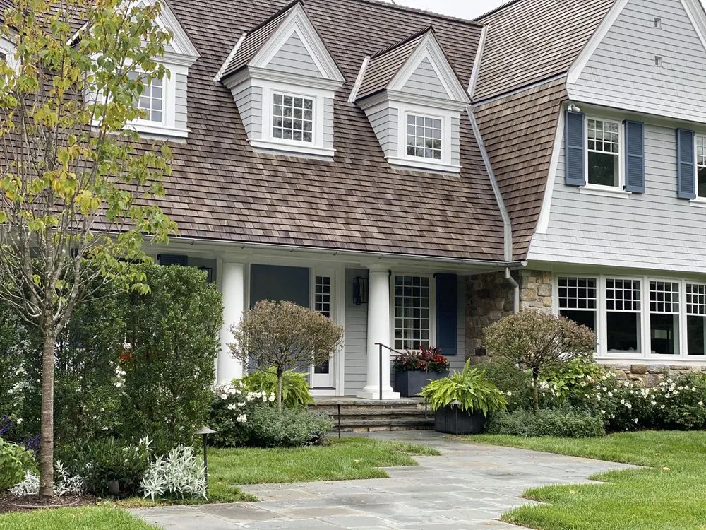 Custom lawn care service for year-round maintenance in Southport, CT by Sasco Farms Landscape Design