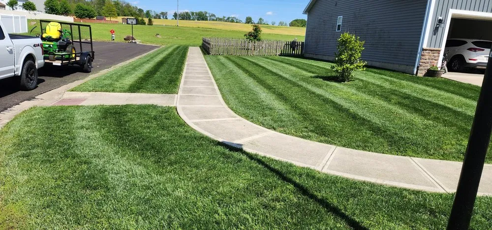 Expert landscape installation in Stoutsville, OH by Sasquatch Lawncare and Landscape