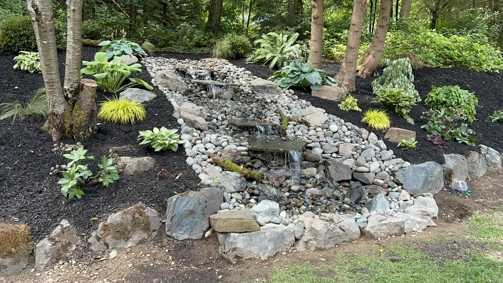 Top-rated lawn care service with custom design in Kent, WA by Sauz Landscaping