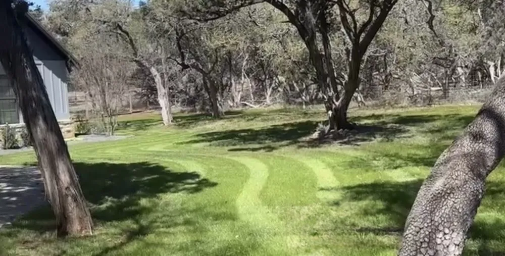 Custom landscape installation in Canyon Lake, TX by Savage Landscaping And Irrigation