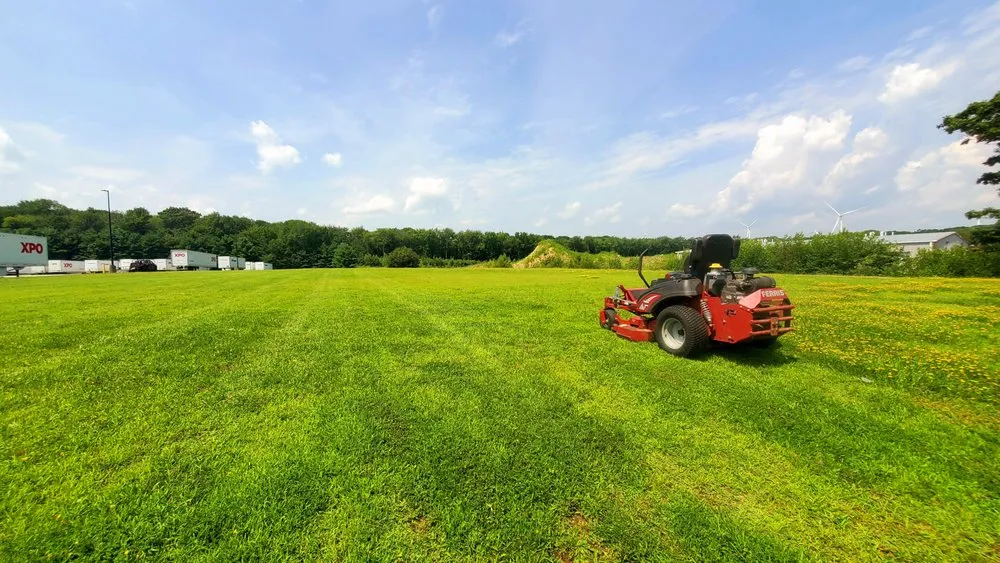 Reliable lawn mowing service in Dartmouth, MA by Savery Property Management