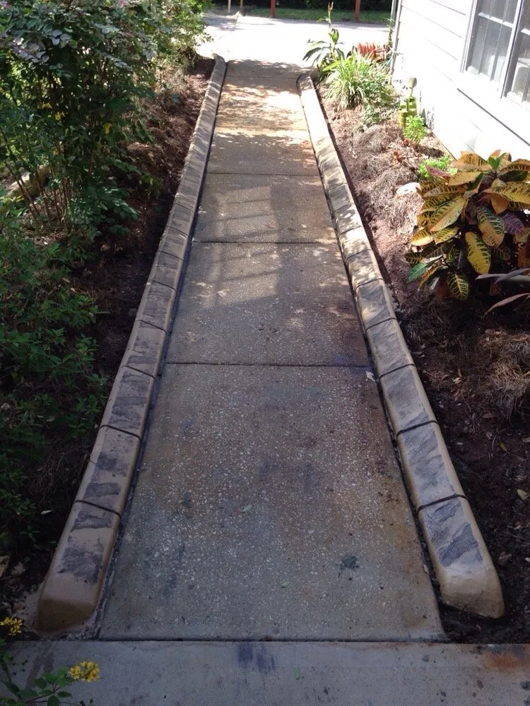 Affordable yard cleanup service for residential properties across Daytona Beach, FL - Sbcurbing and Landscaping