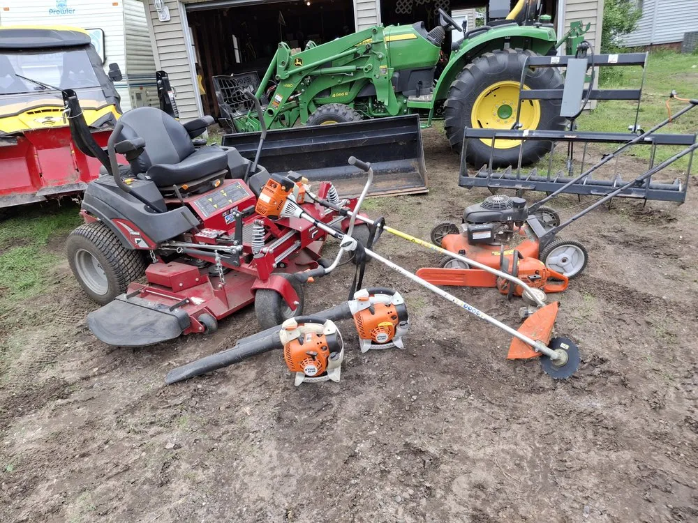 Trusted lawn mowing service for homes across Iron Mountain, MI - SC And Sons