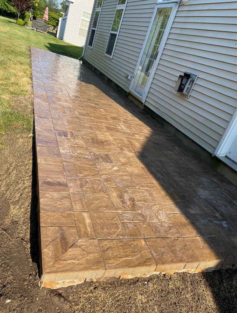 Affordable lawn mowing service for residential properties in Pine Beach, NJ by S&C concrete