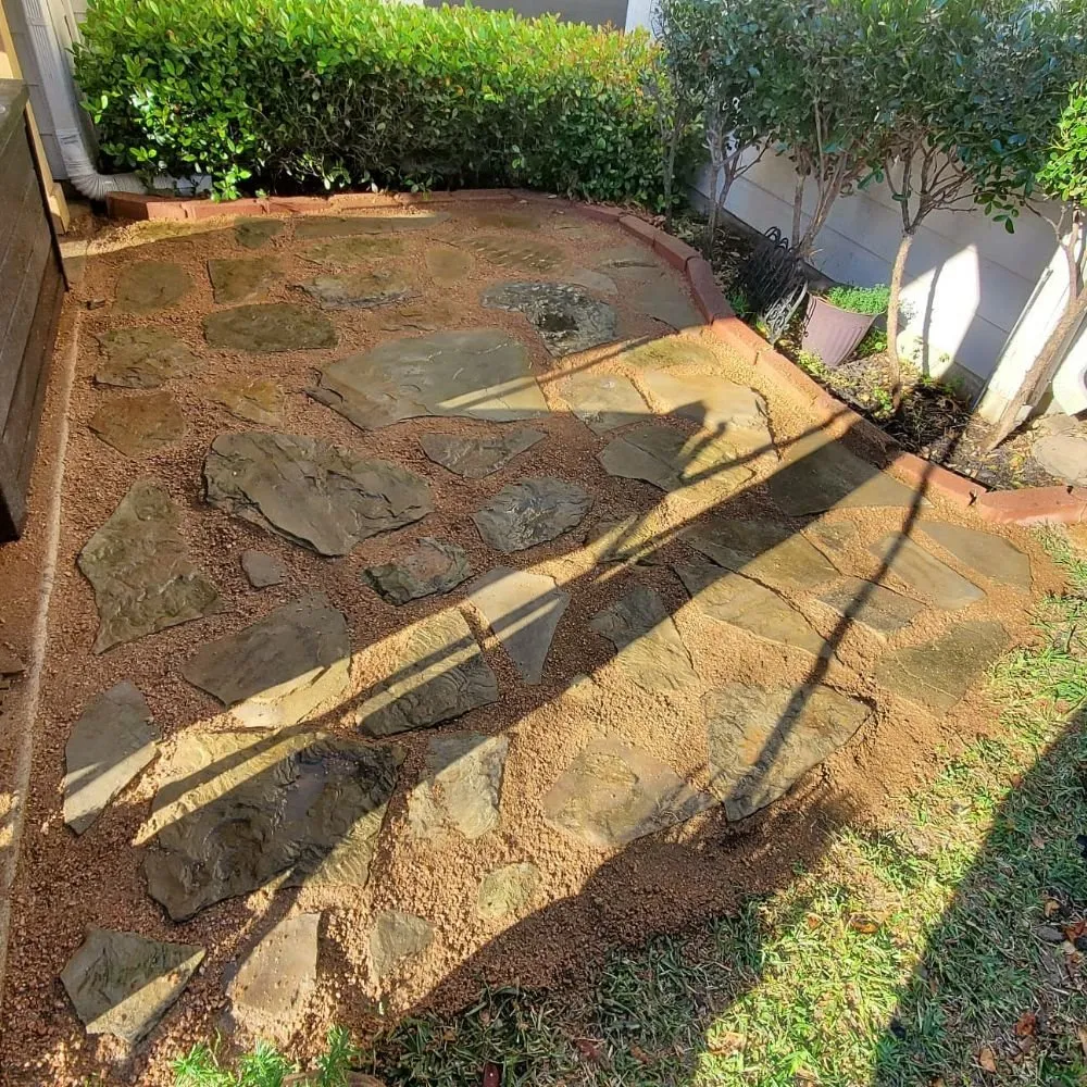 Local yard maintenance for year-round maintenance in River Oaks, TX by Scallion Landscaping