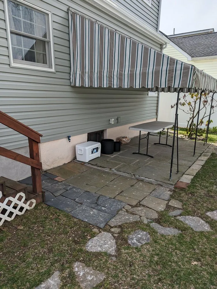 Affordable yard cleanup service with custom design across West Babylon, NY - Scanapico Bros Landscaping