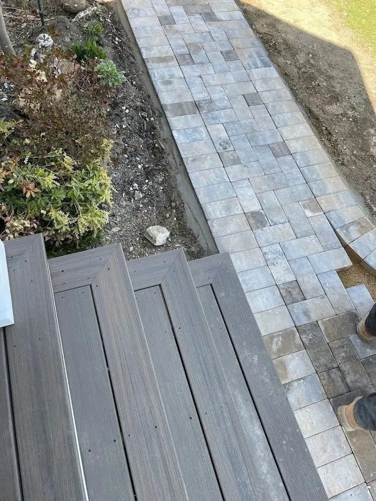 Custom lawn care service with custom design across West Babylon, NY - Scanapicos Landscaping & Masonry