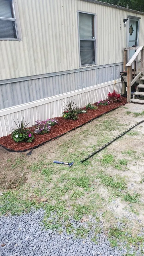 Professional residential landscaping for residential properties in Smithfield, VA by Scapers