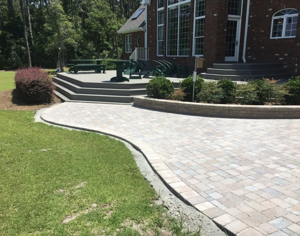 Affordable lawn mowing service for beautiful yards in Morehead City, NC by Scapes by Steven