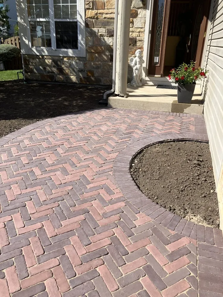 Professional residential landscaping for year-round maintenance in Bartlett, IL by Scardino Lanscape & Design