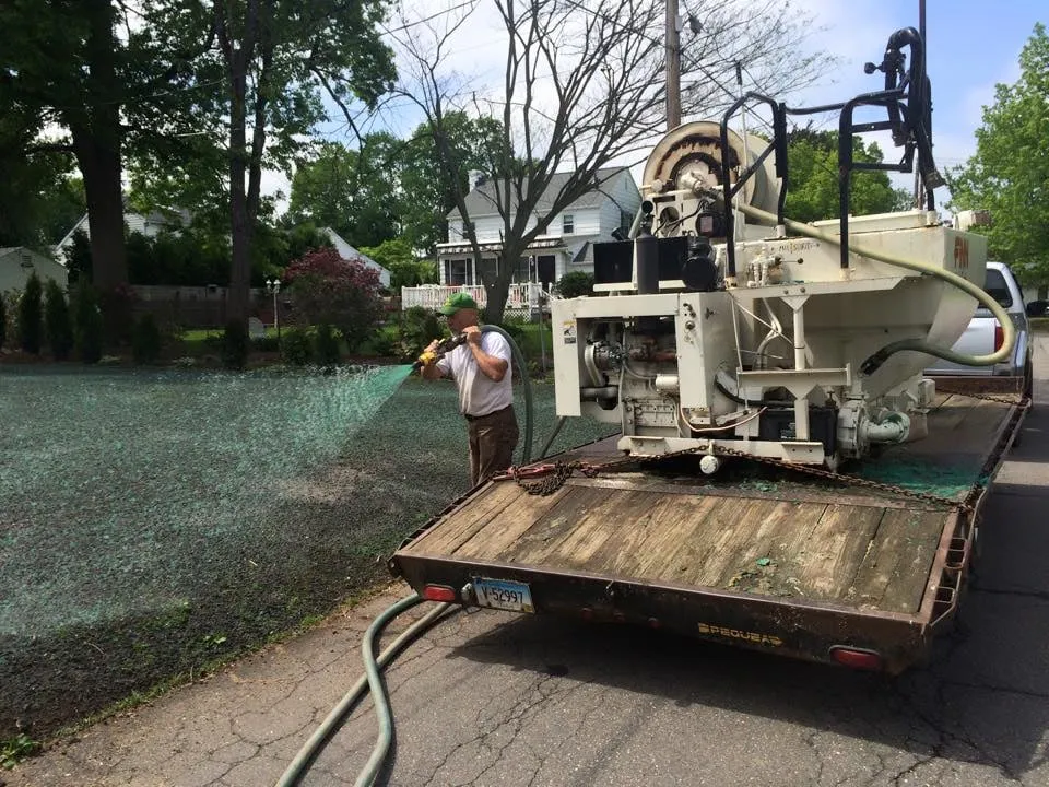 Affordable lawn mowing service with custom design in Rocky Hill, CT by Scenic Landscaping & Property Maintenance