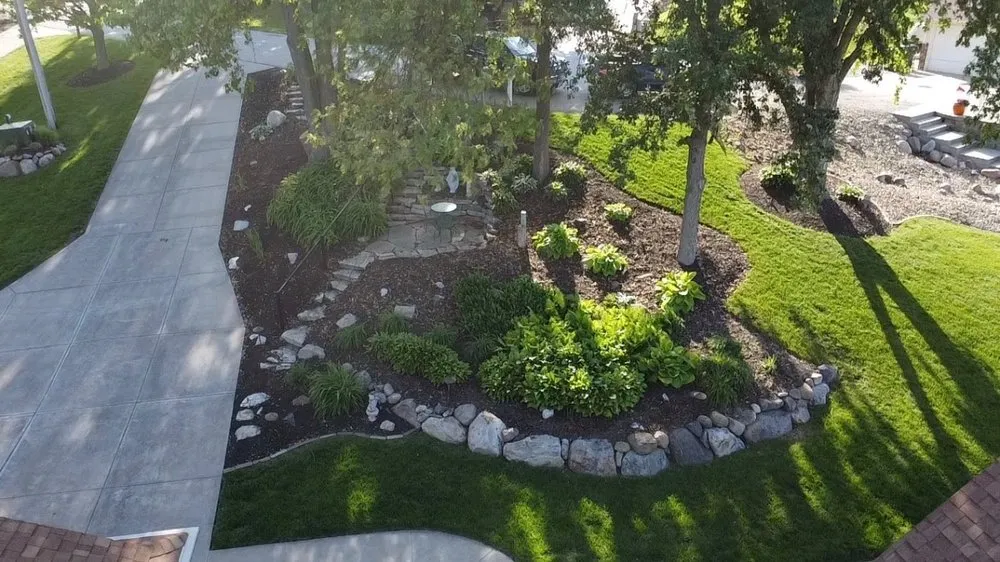 Affordable lawn mowing service in Springfield, NE by ScharpScapes