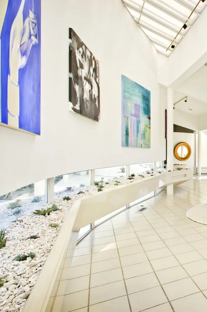 Professional landscape installation with custom design in GRANDE POINTE, FL by SCHEER INTERIOR DESIGN