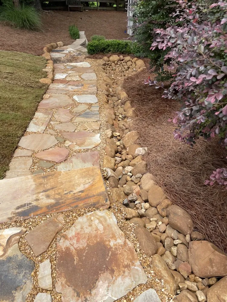 Reliable lawn mowing service with custom design in Dallas, GA by Schlampp Turf Management