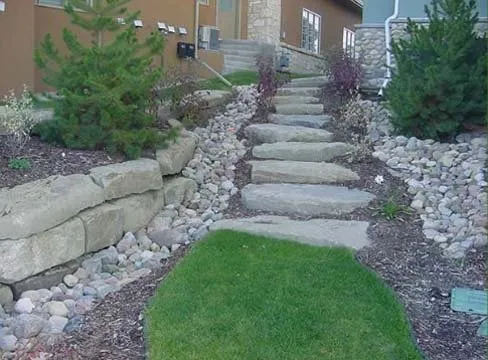 Custom landscape installation in Sheboygan Falls, WI by Schmidt's Landscaping