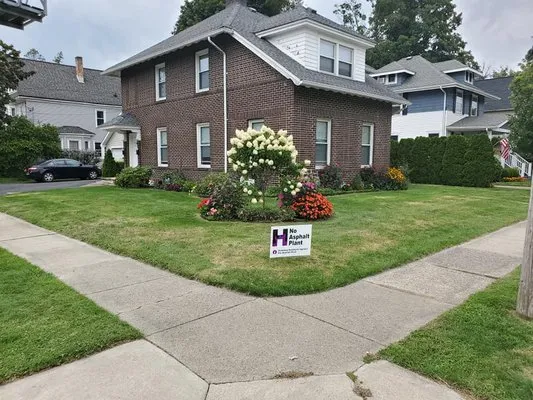 Schmidty's Lawn Care Logo