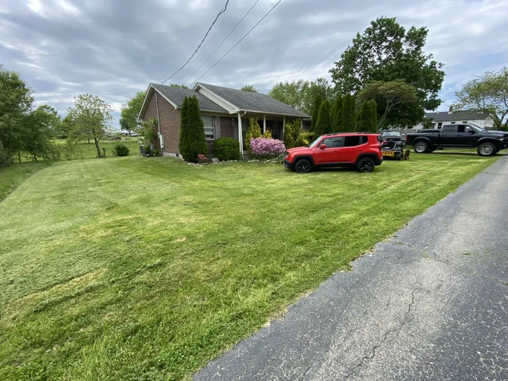 Professional yard maintenance for homes in Springfield, KY by Schmitty’s Lawn Care
