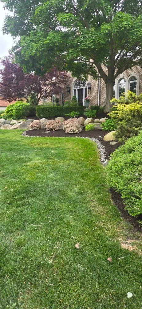 Affordable lawn mowing service for outdoor upgrades across Rochester Hills, MI - Schooks Landscaping