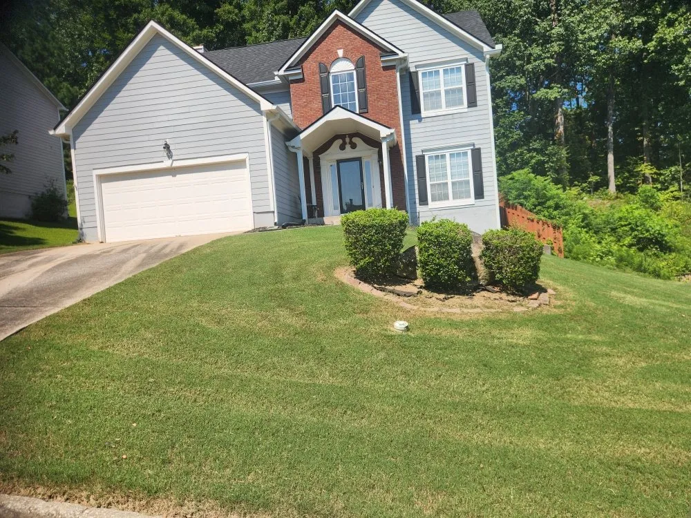 Top-rated lawn mowing service for year-round maintenance in Loganville, GA by School Boys Lawn Service