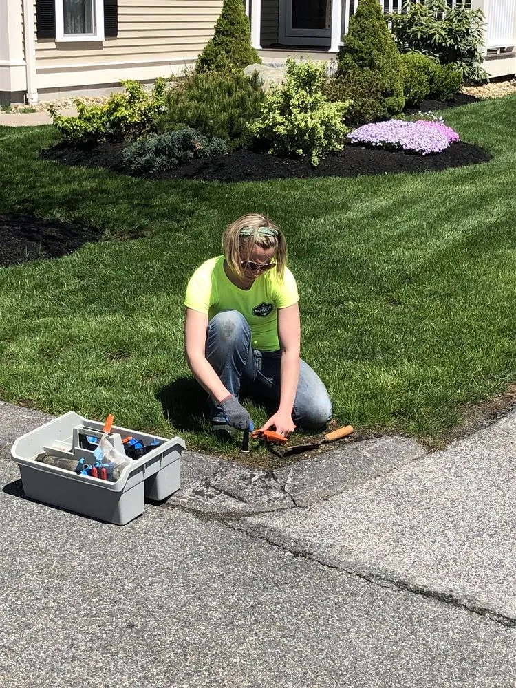 Affordable landscape installation with custom design in Newton, NH by Schulte