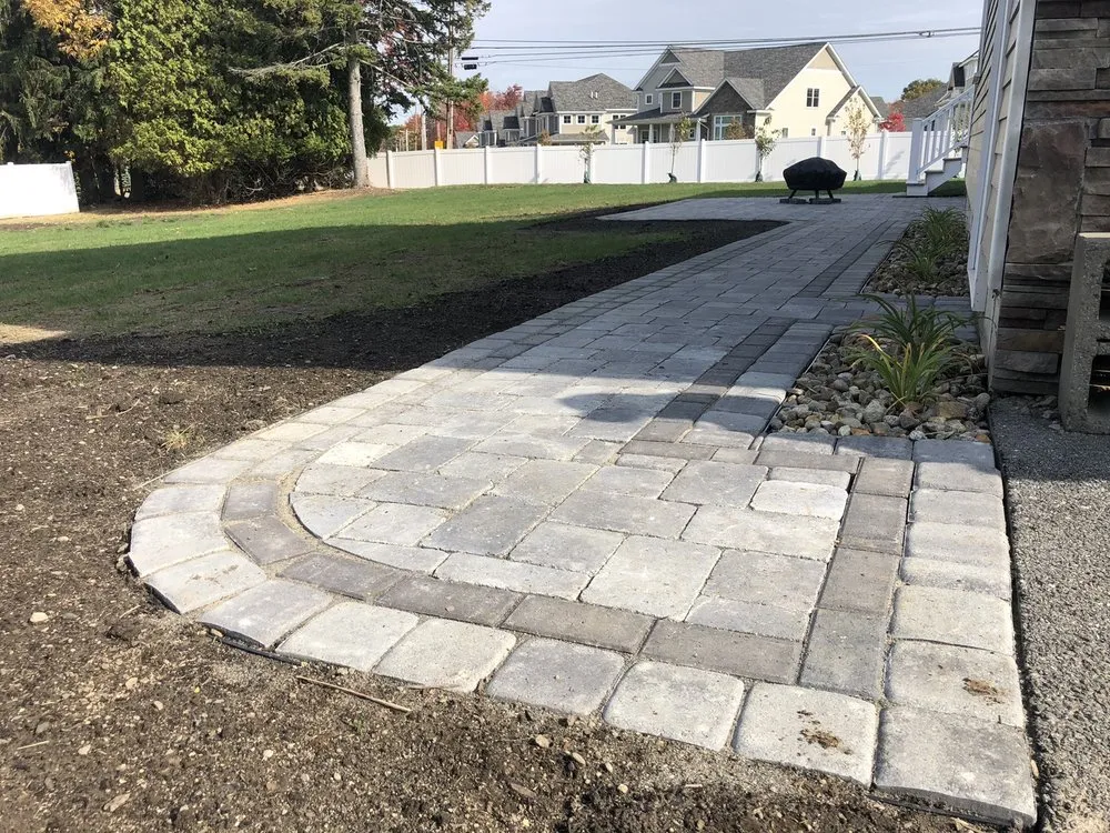 Custom yard maintenance with custom design in Newton, NH by Schulte