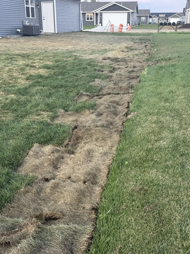 Custom residential landscaping for year-round maintenance in Menasha, WI by Schultz Lawn Care