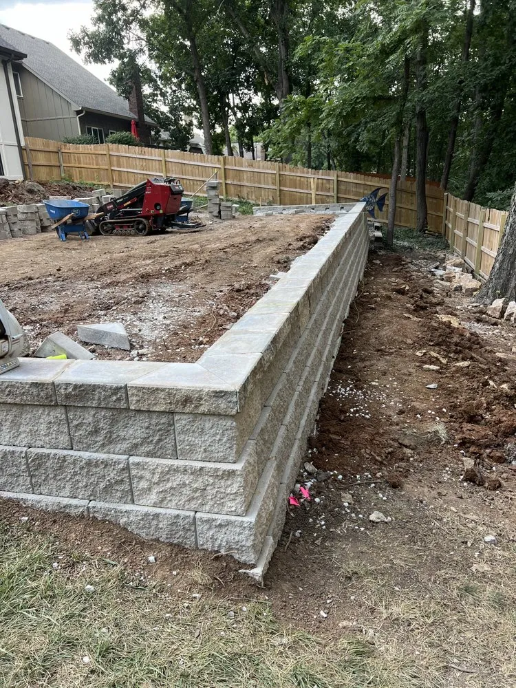 Local lawn care service for year-round maintenance in Kansas City, MO by Scorpion Landscaping KC