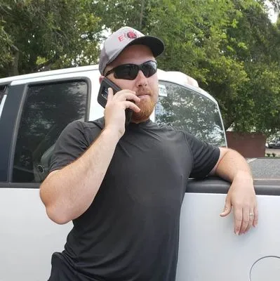 Scott & Sons Cutting Edge Lawn Care Logo