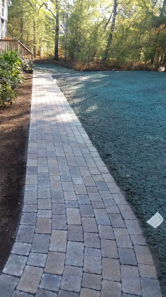 Custom lawn mowing service for year-round maintenance in Plymouth, MA by Scott E Flora Lawn Irrigation