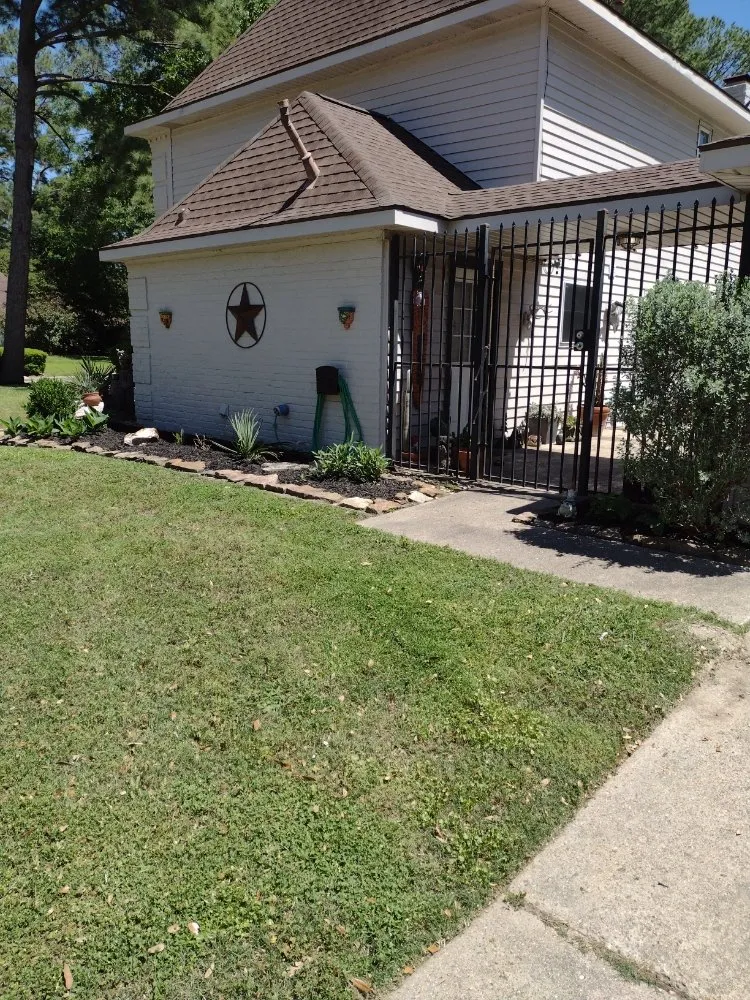 Top-rated lawn mowing service with custom design in Houston, TX by Scotts Do All