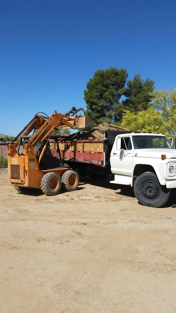 Trusted lawn mowing service in Tucson, AZ by Scott's Dump Truck & Tractor Service