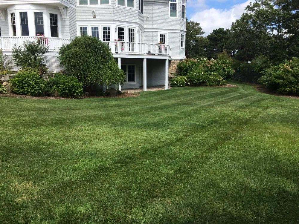 Reliable lawn mowing service for year-round maintenance in Yarmouth, MA by Scott's Landscaping Property Management