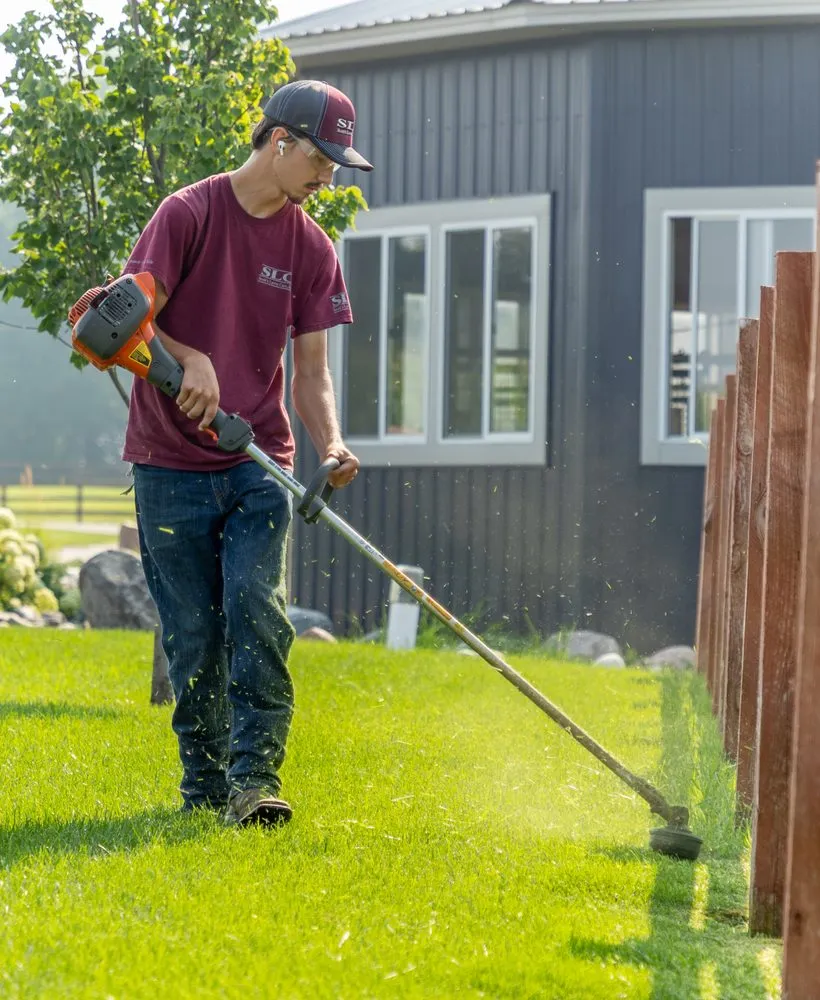 Affordable landscape design with custom design in Maple Plain, MN by Scott's Lawn Care