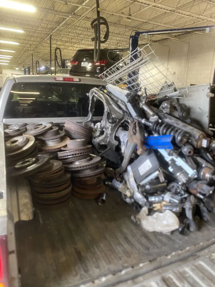 Custom lawn mowing service with custom design in Overland Park, KS by Scrap Metal Removal