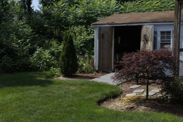 SCZ’s Landscaping And Yard Work Logo