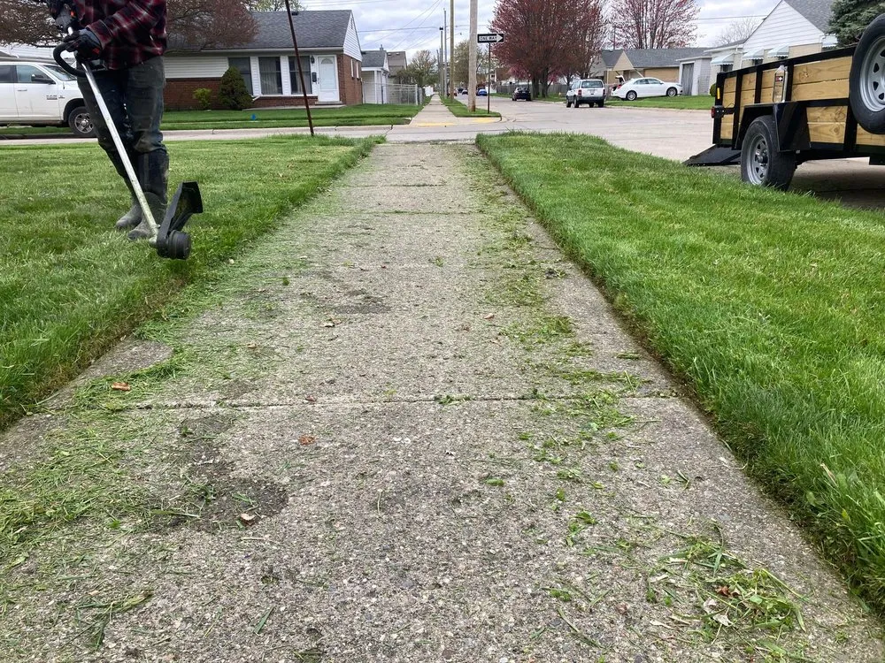 Custom lawn mowing service for outdoor upgrades across Wyandotte, MI - S&E Landscaping Excavation