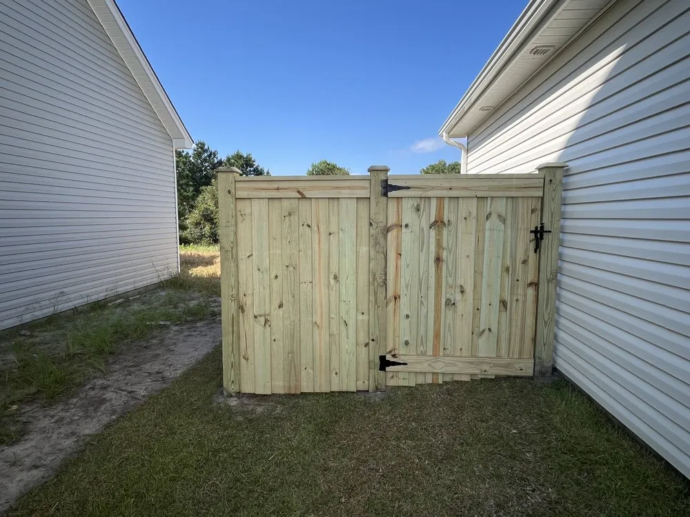 Custom landscape installation in Hampstead, NC by Sea Coast Fence & Yardscape