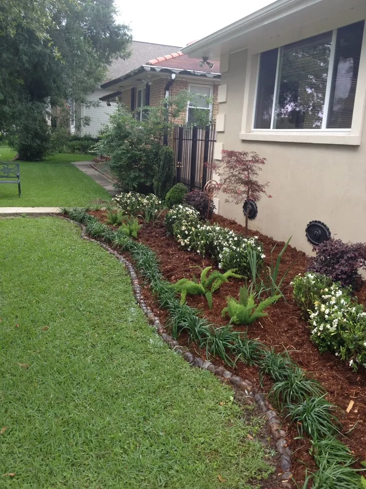 Custom landscape installation with custom design in New Orleans, LA by Sean's Landscaping