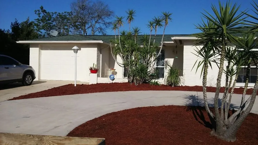 Custom landscape installation in New Port Richey, FL by Seasonal Lawn Care Services