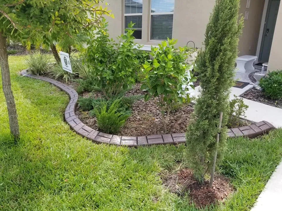 Custom outdoor landscaping in Wimauma, FL by Second 2 None Artisan Landscape Curbing