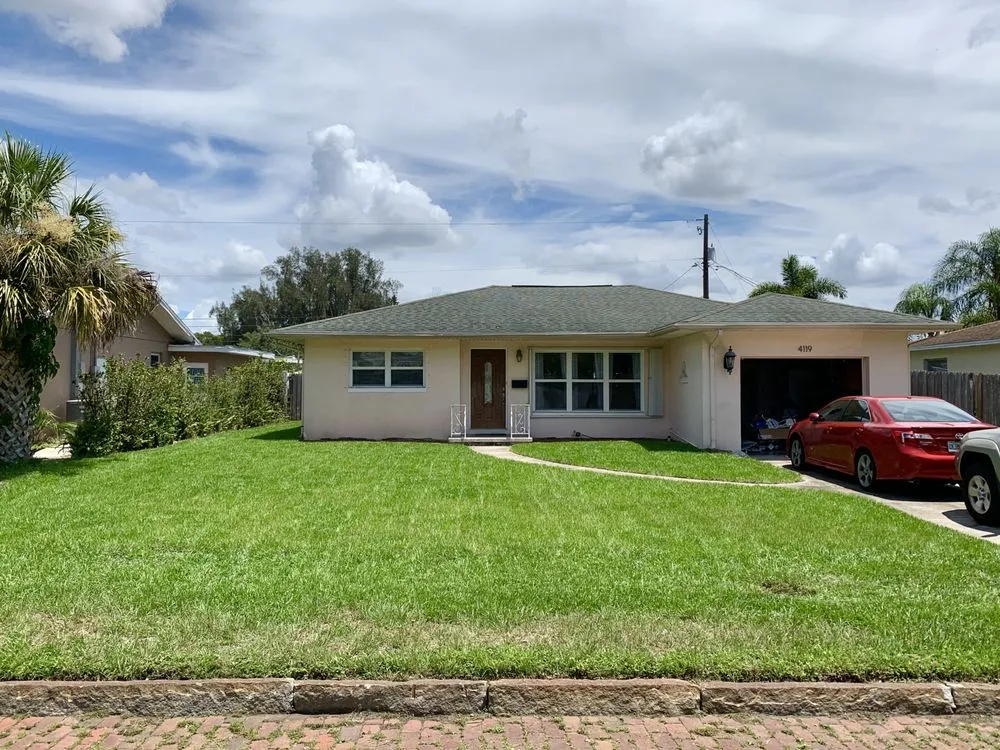 Affordable lawn care service for residential properties in Saint Petersburg, FL by Second Nature Landscaping